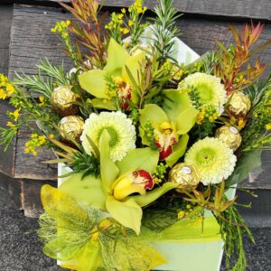 Posy arrangement of fresh flowers. Self contained with chocolates