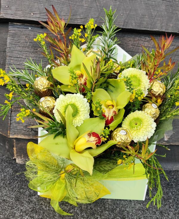 Posy arrangement of fresh flowers. Self contained with chocolates