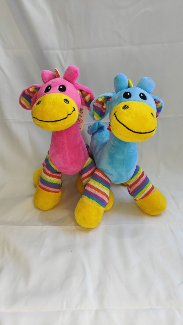 Rainbow coloured giraffe/teddy for baby or childs toy.